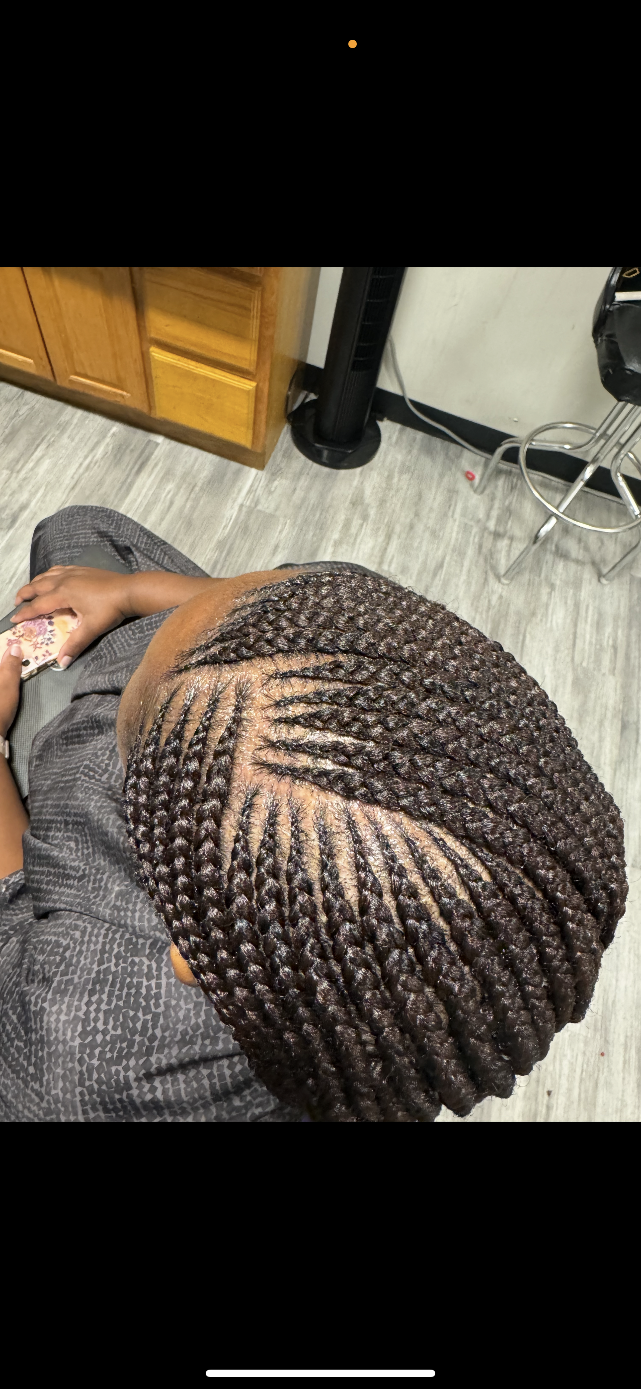 Cornrow braids in intricate patterns