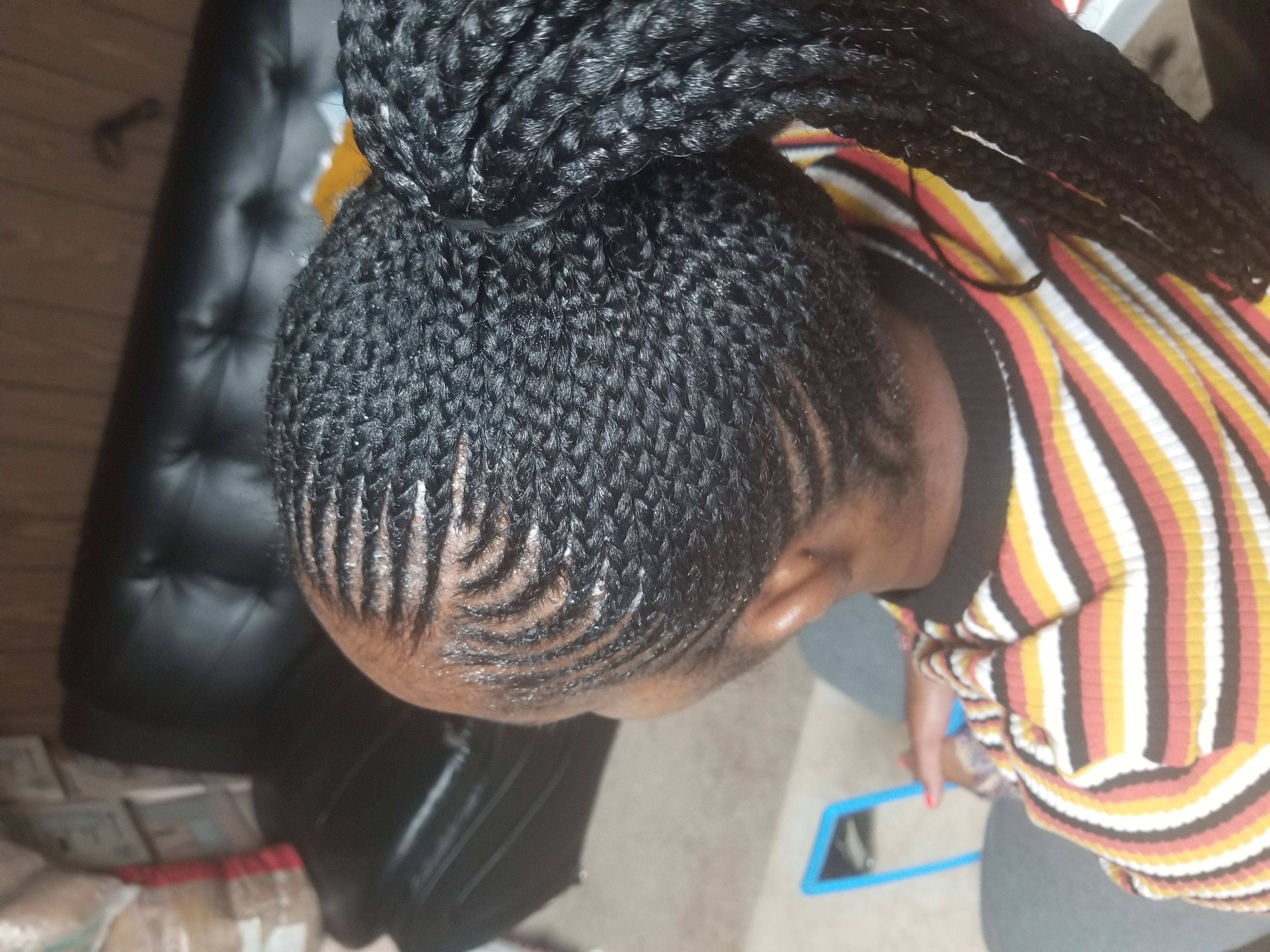 Kids braiding with colorful beads