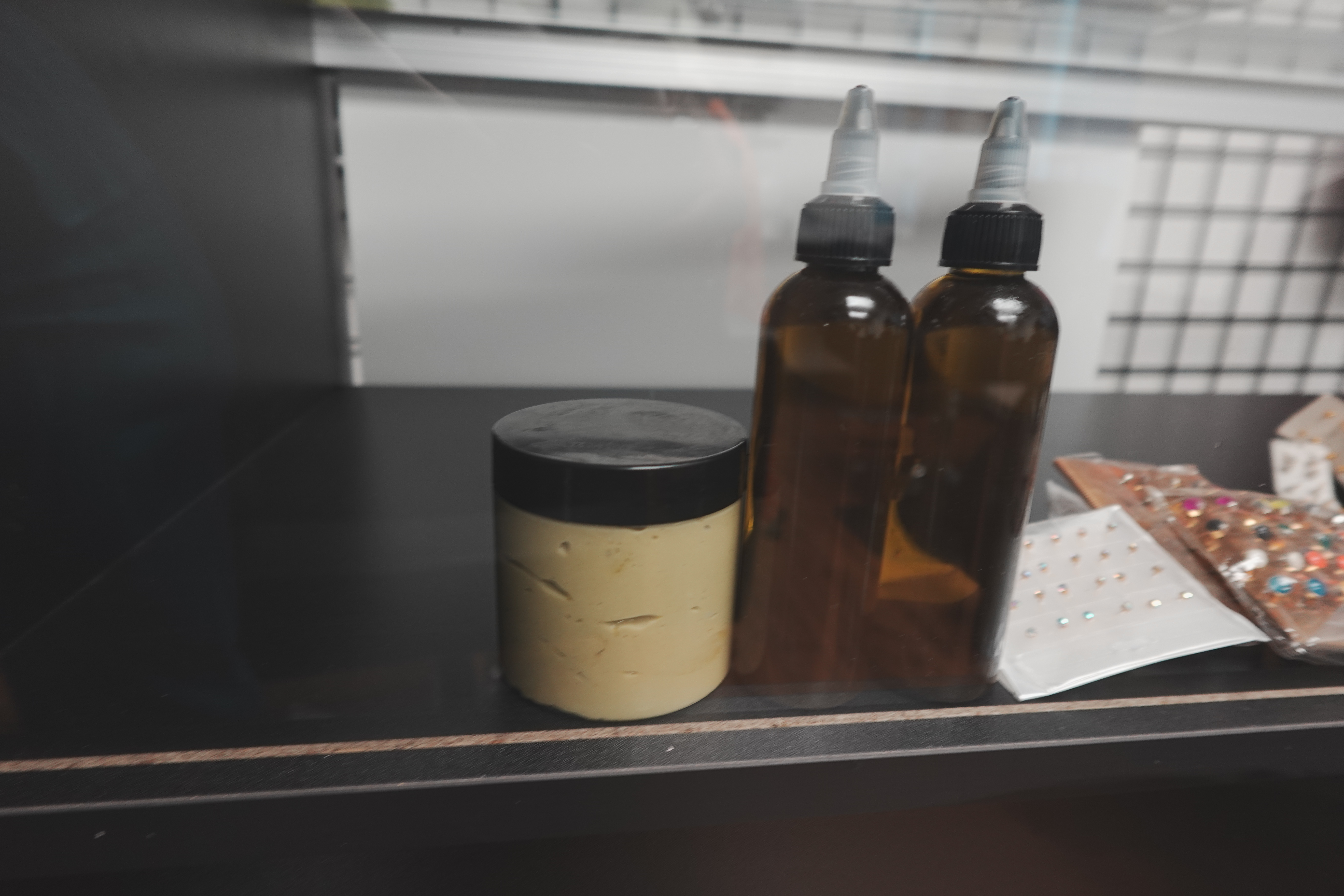 Display of natural hair products, oils, and extensions